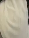The fabric of the cream pants is 180-gram Chenille beige velvet in stock, and it is made of a composite fabric details Picture